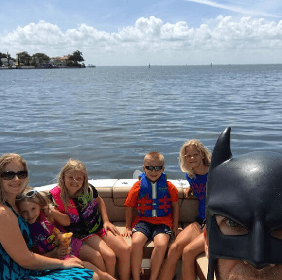 Jennifer Smith With Her Family And Batdad In A Boat